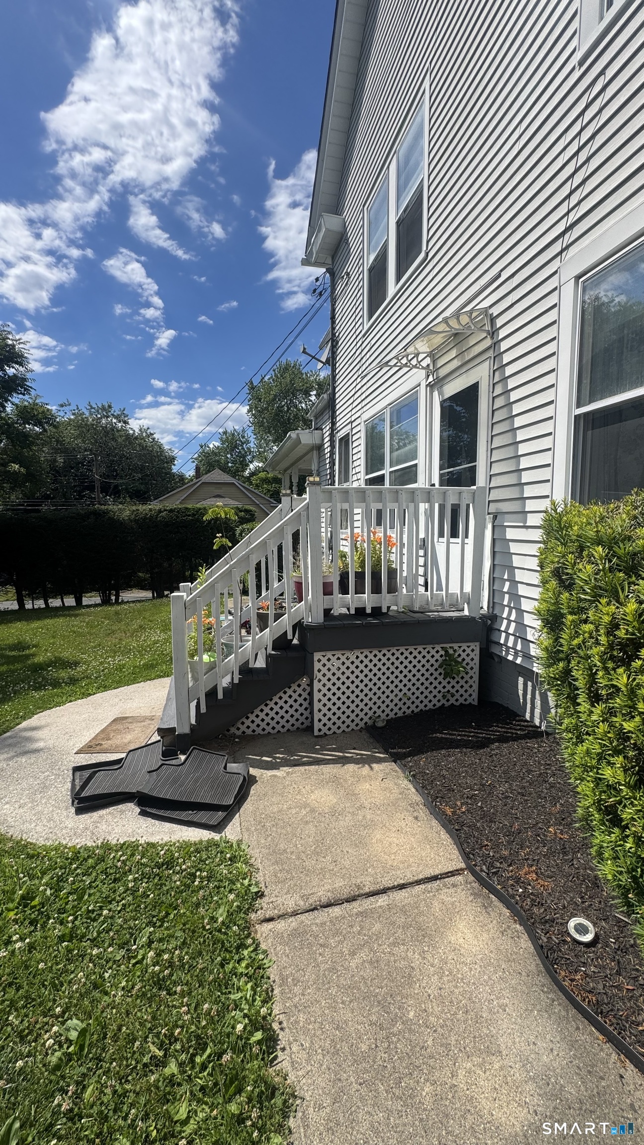 104 Prospect Street Ansonia, CT 06401 - Photo 13 of 40 a view of a house with sitting area and a lake view