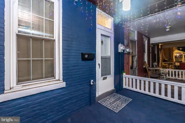 a view of an entrance to house with a room