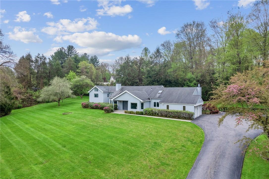 27 Creemer Road Armonk, NY 10504 - Photo 1 of 1 a view of a house with a big yard
