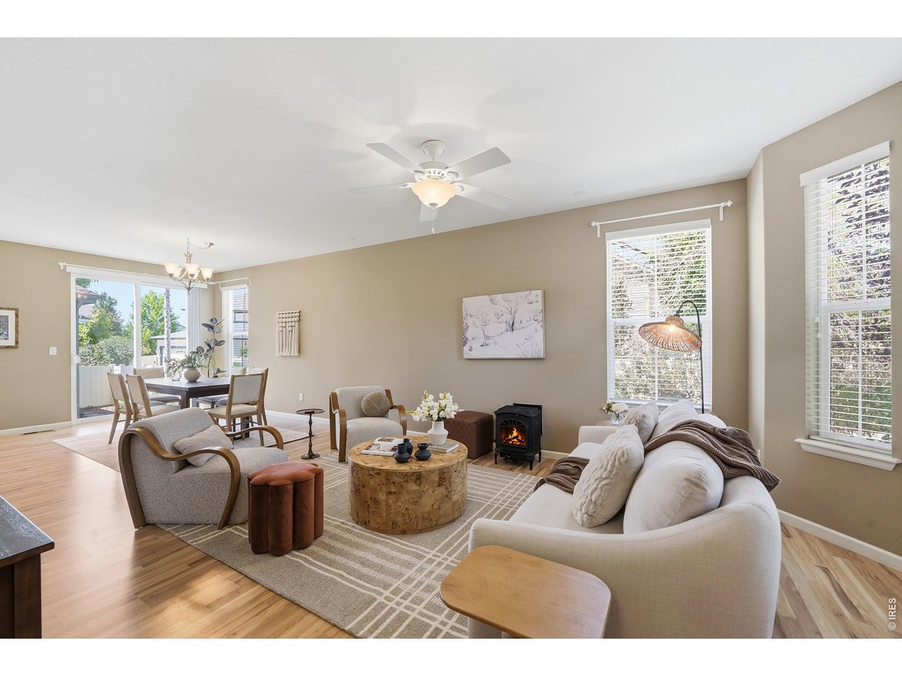 340 Riverton Road Lafayette, CO 80026 - Photo 4 of 37 Open living and dining areas with wood flooring throughout the main level