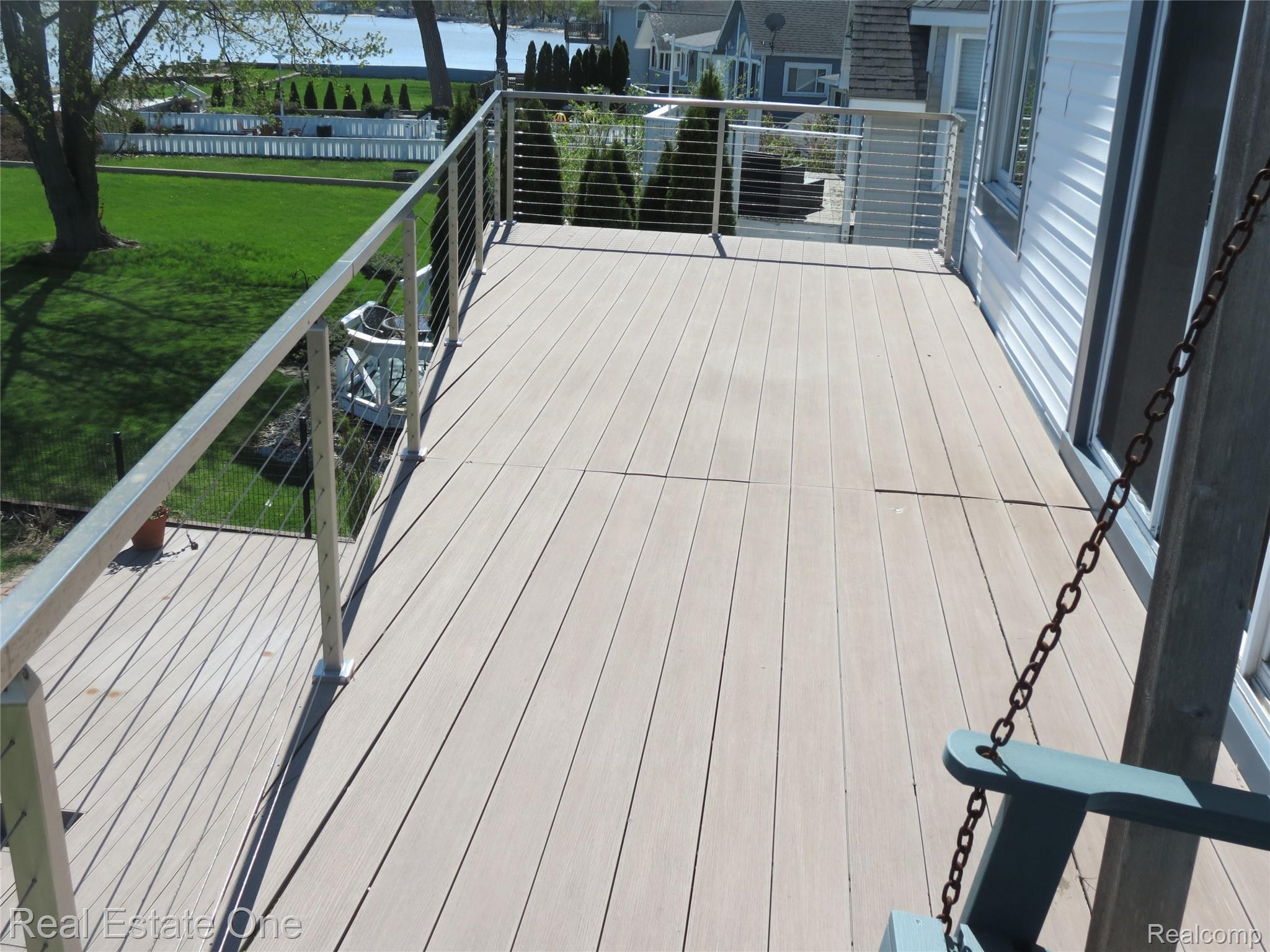 4583 Allen Cove Road Luna Pier, MI 48157 - Photo 6 of 50 Upper level deck off of the Primary Bedroom.
