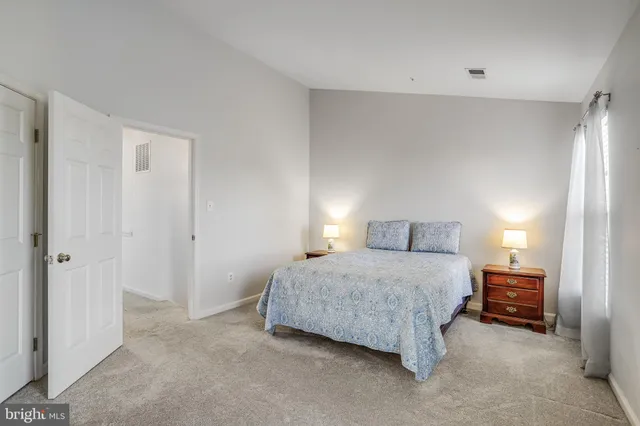 a view of a house with wooden deck