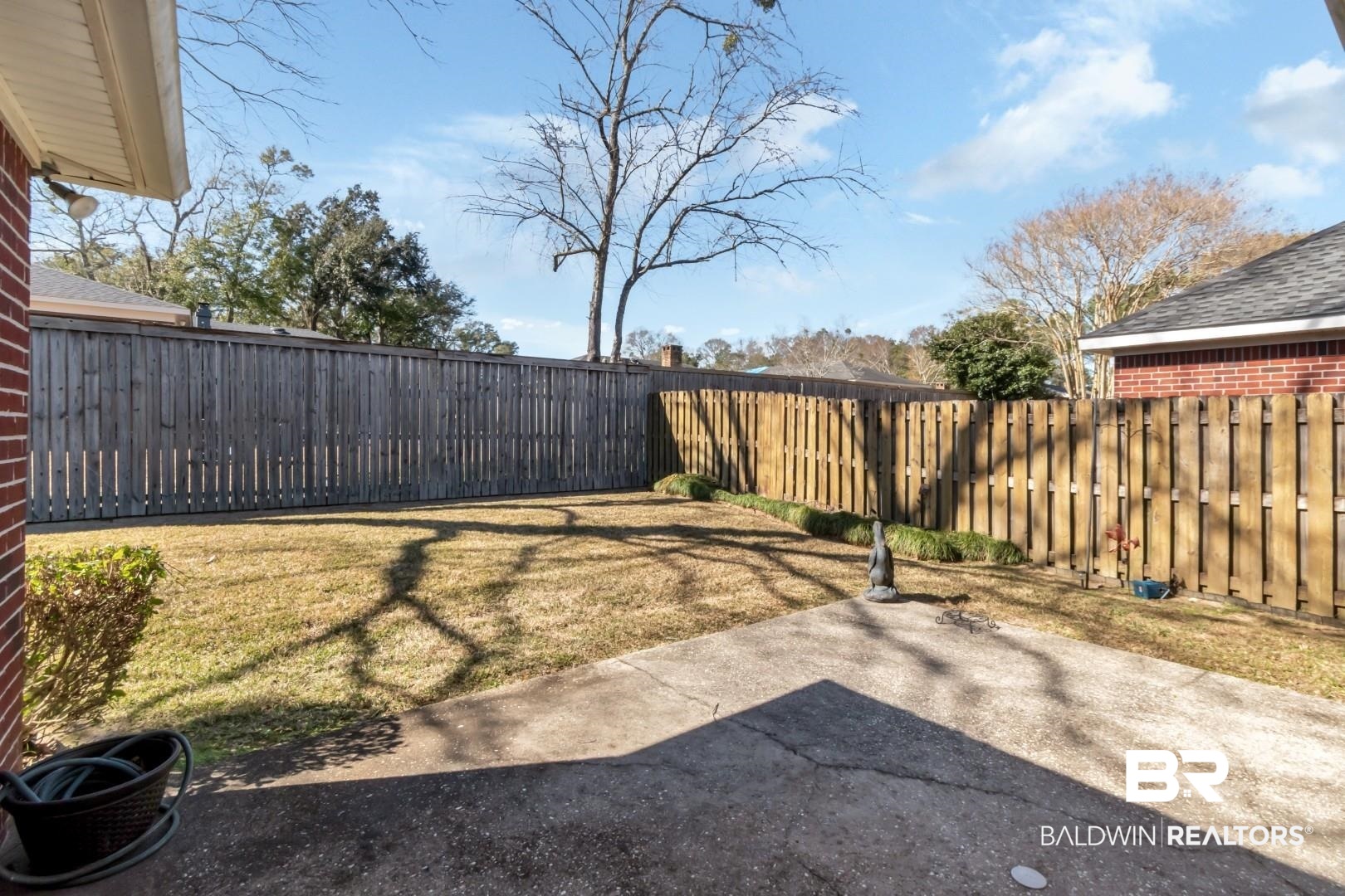 1032 Cross Gates Place Mobile, AL 36609 - Photo 28 of 34 Fenced backyard with a patio