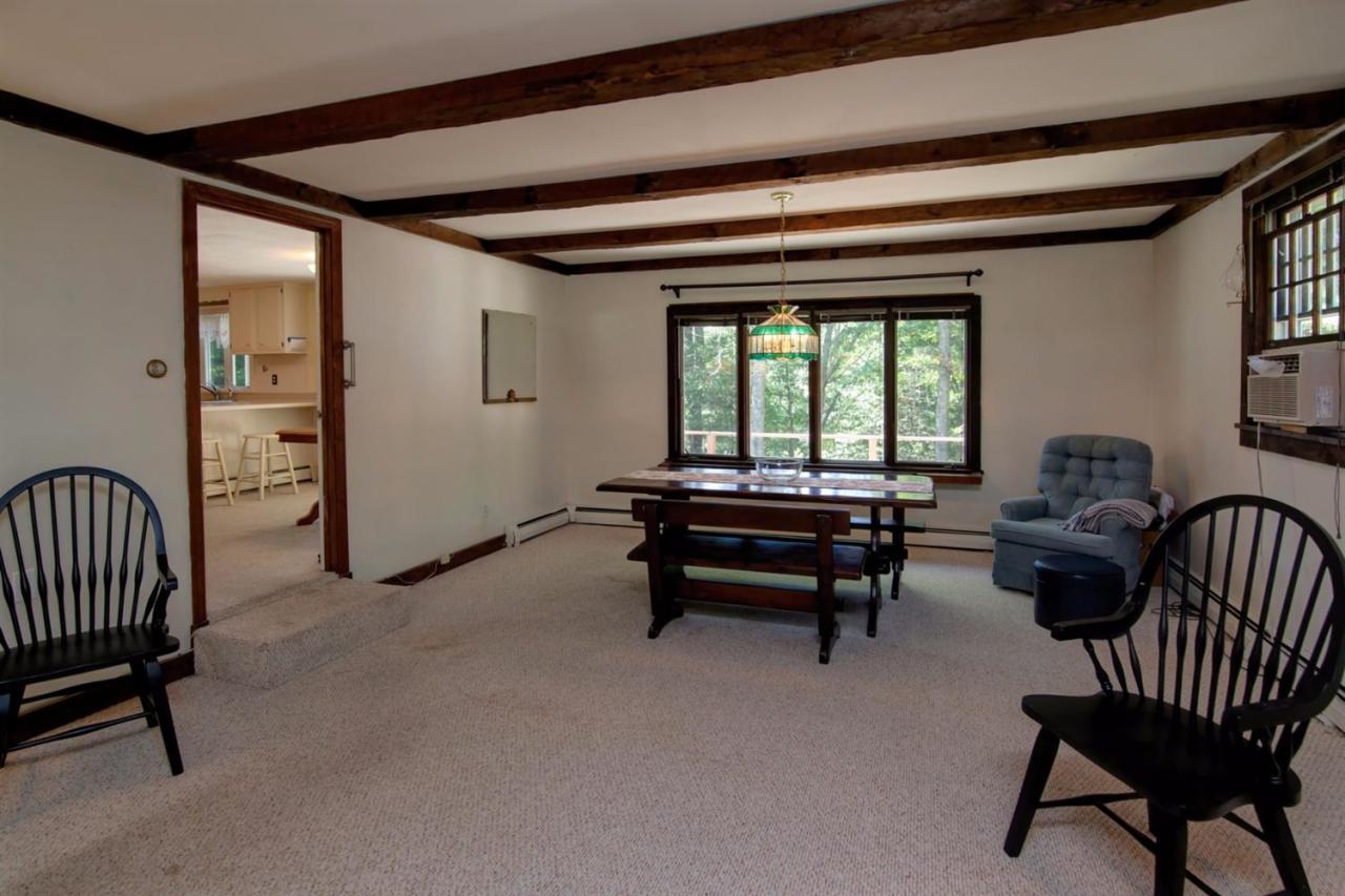 67 Lumbert Mill Road Centerville, MA 02632 - Photo 10 of 18 a living room with furniture and a window