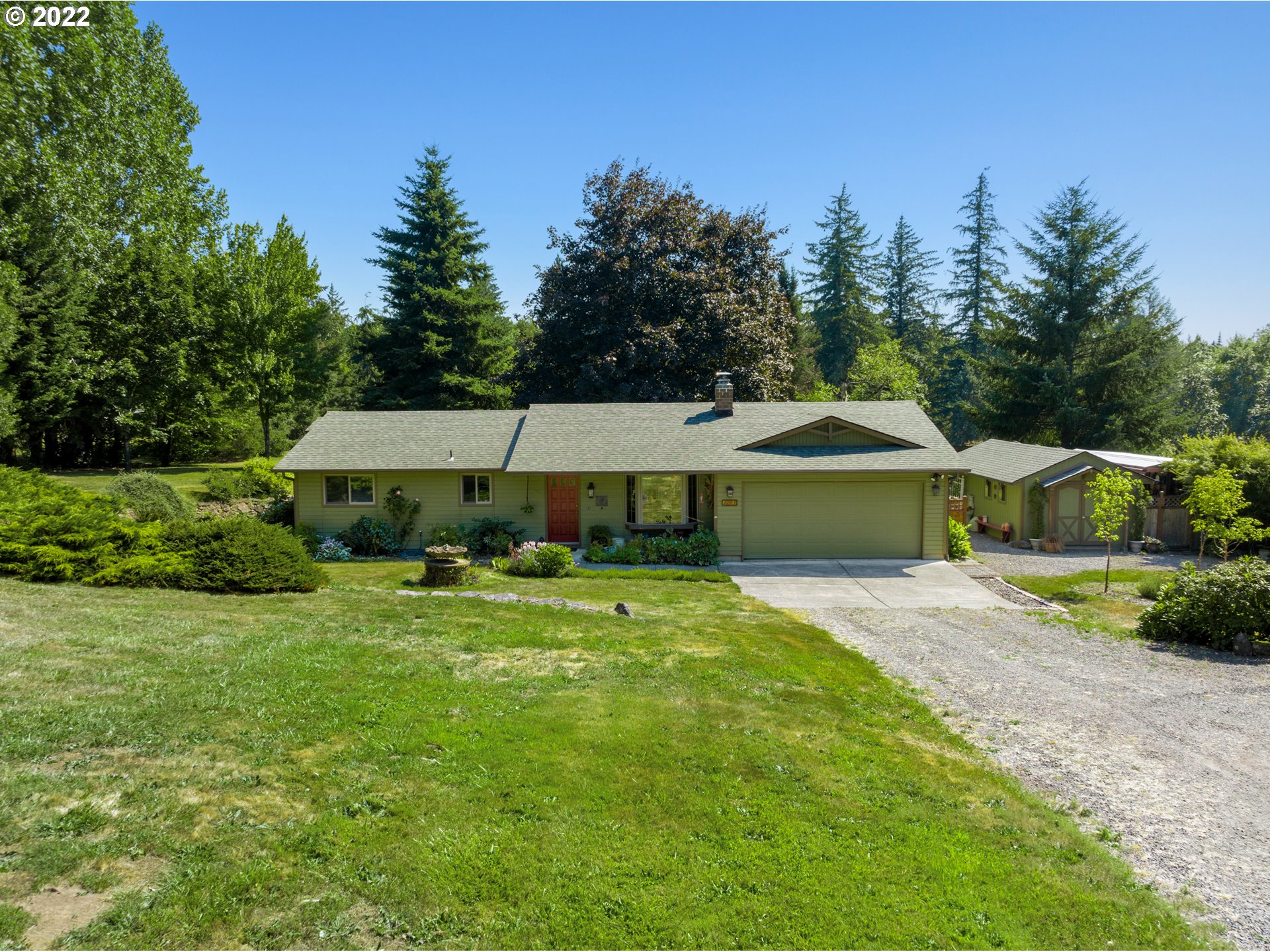 22913 Northeast 16th Street Camas, WA 98607 - Photo 1 of 32 a front view of a house with yard patio and green space