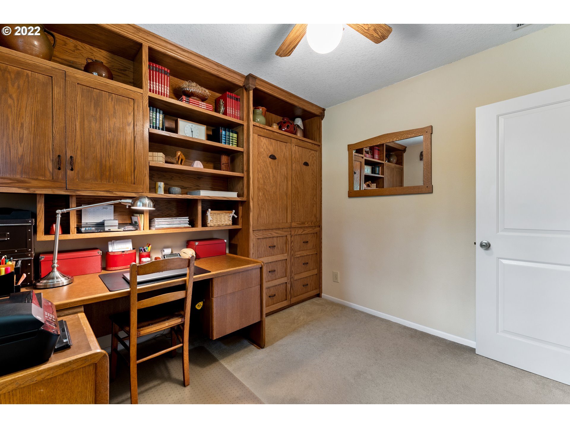 22913 Northeast 16th Street Camas, WA 98607 - Photo 16 of 32 a room with furniture and a book shelf