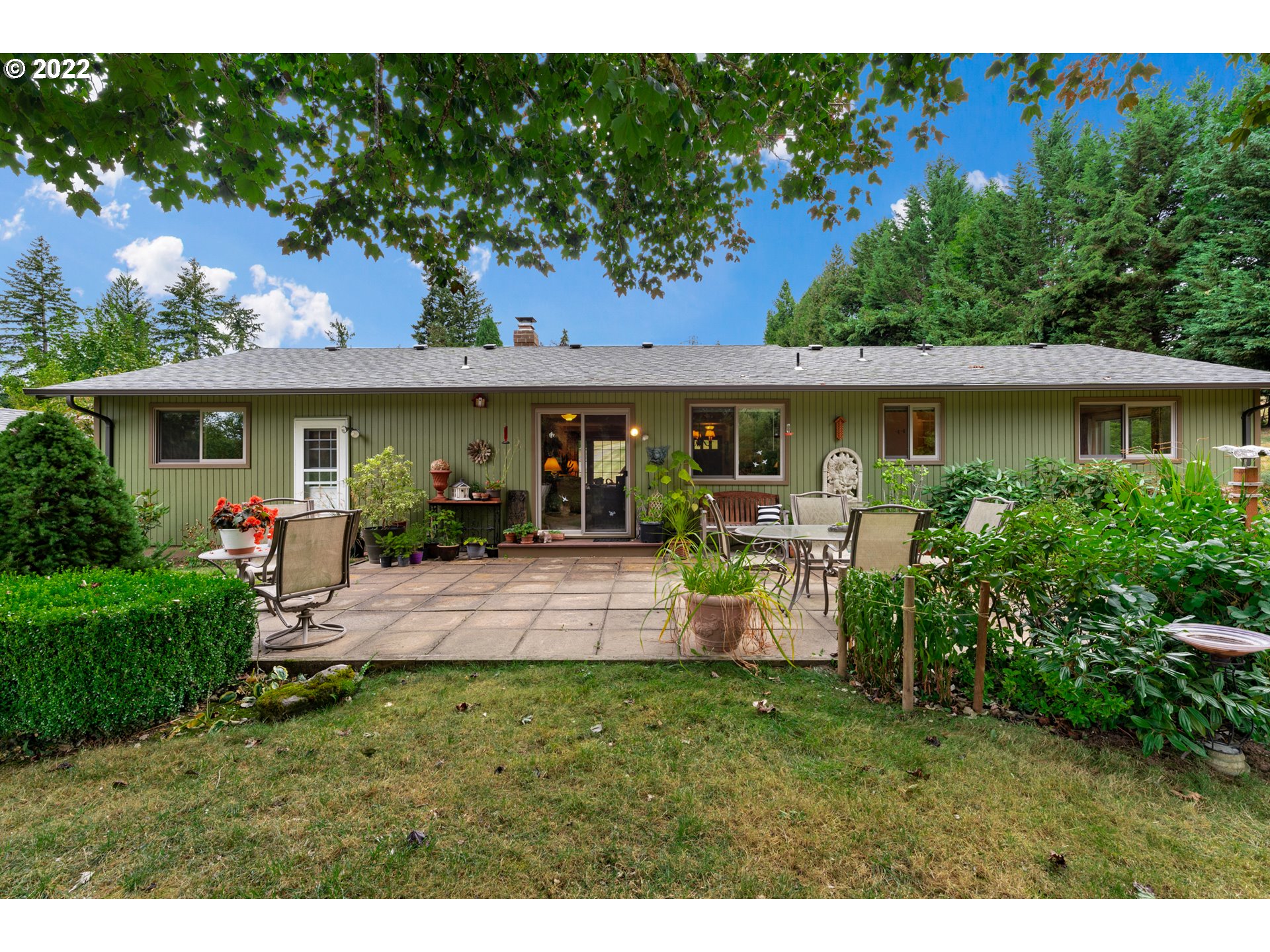 22913 Northeast 16th Street Camas, WA 98607 - Photo 19 of 32 a front view of a house with porch and garden