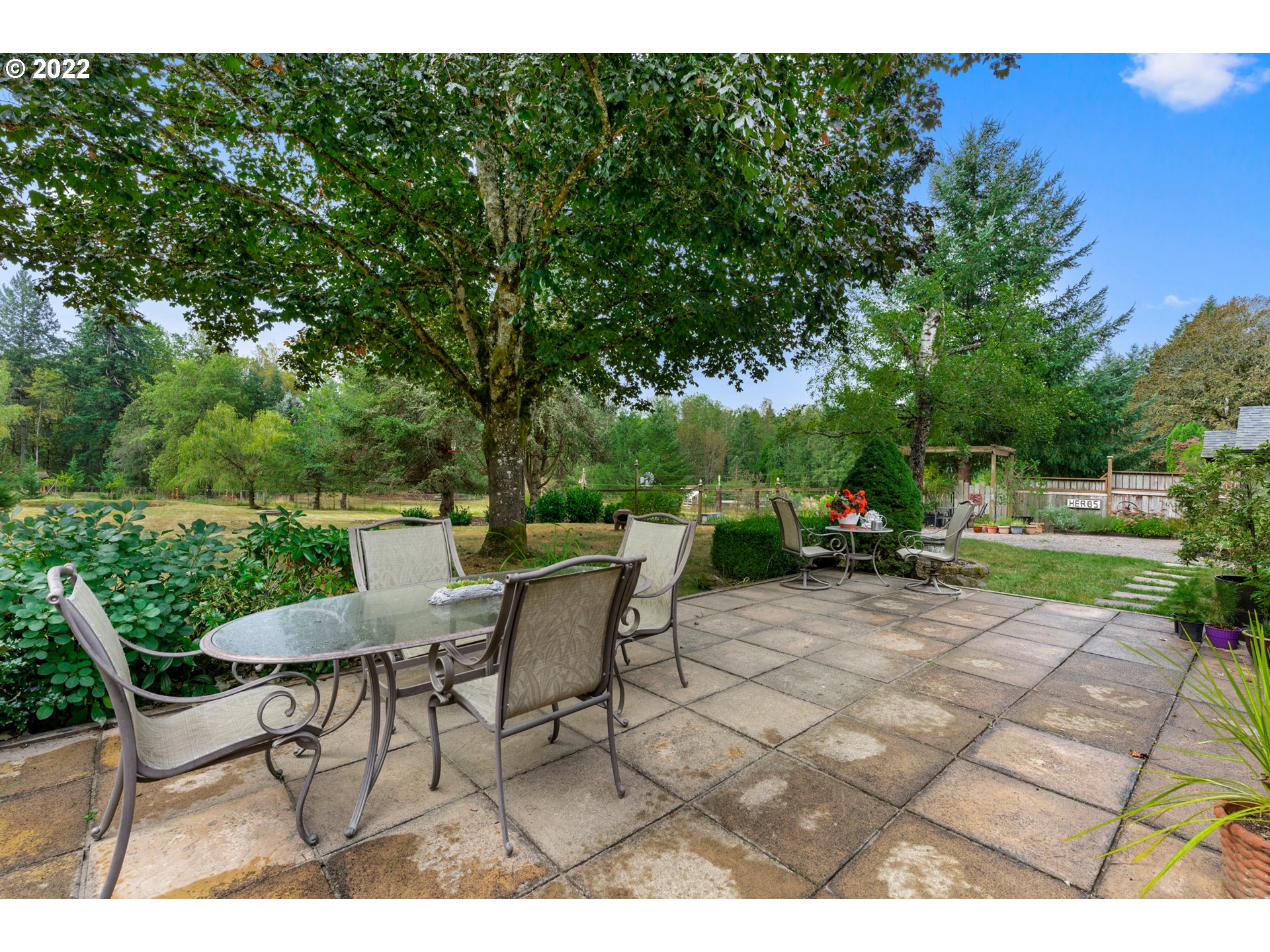 22913 Northeast 16th Street Camas, WA 98607 - Photo 20 of 32 a view of a patio with a table and chairs and couches