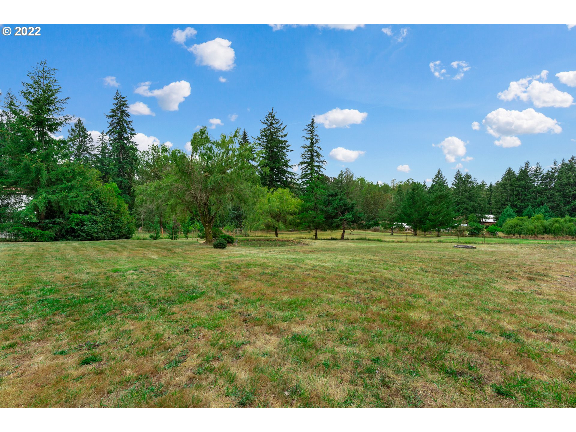 22913 Northeast 16th Street Camas, WA 98607 - Photo 22 of 32 a view of a green field