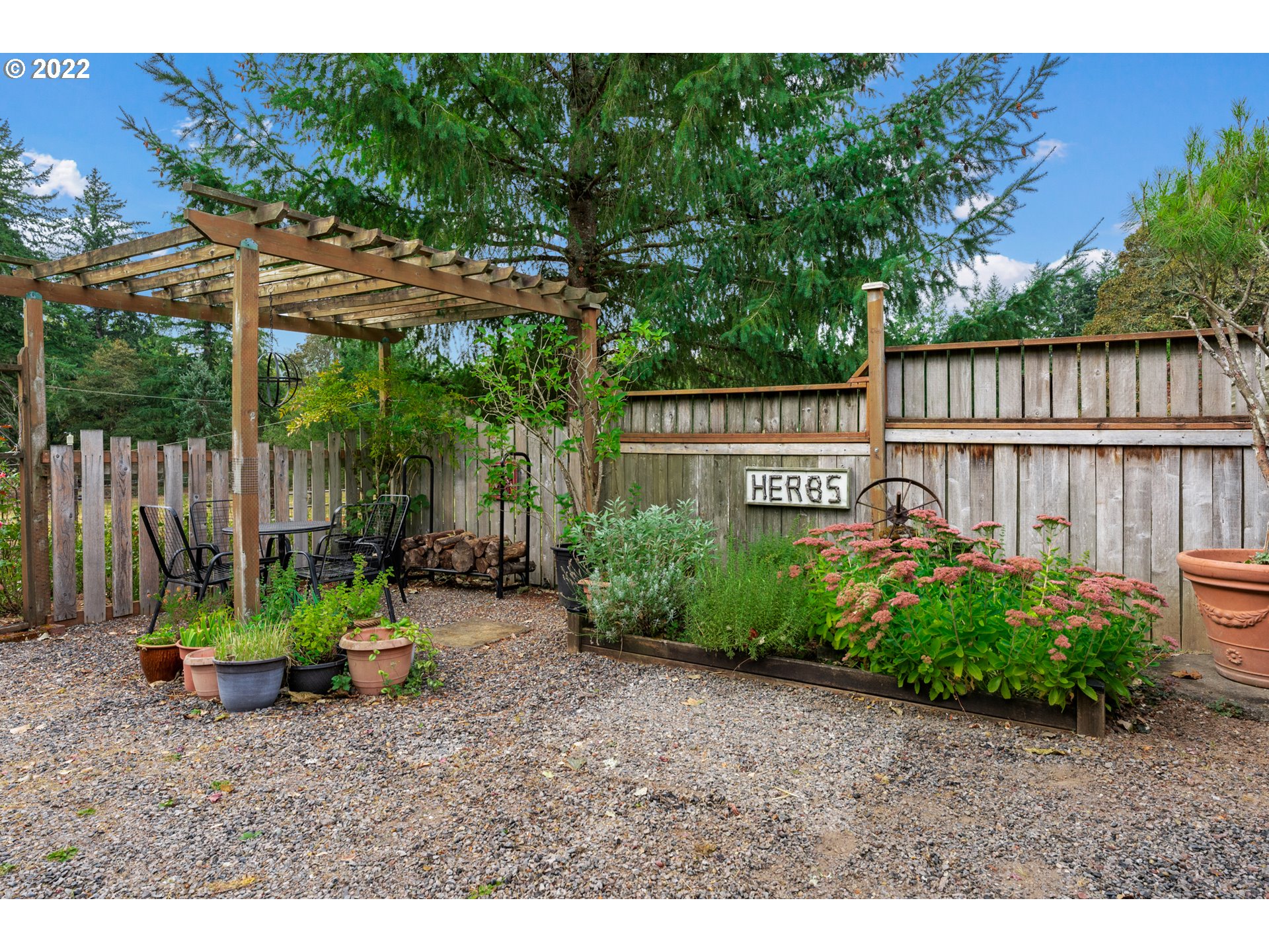 22913 Northeast 16th Street Camas, WA 98607 - Photo 25 of 32 a view of a dinning table and chairs in patio