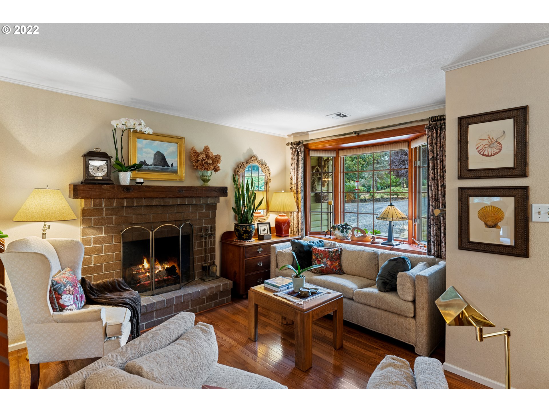 22913 Northeast 16th Street Camas, WA 98607 - Photo 3 of 32 a living room with furniture and a fireplace