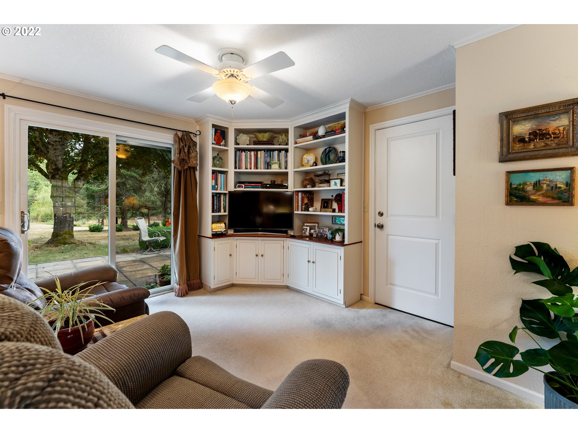 22913 Northeast 16th Street Camas, WA 98607 - Photo 8 of 32 a living room with furniture potted plant and a large window