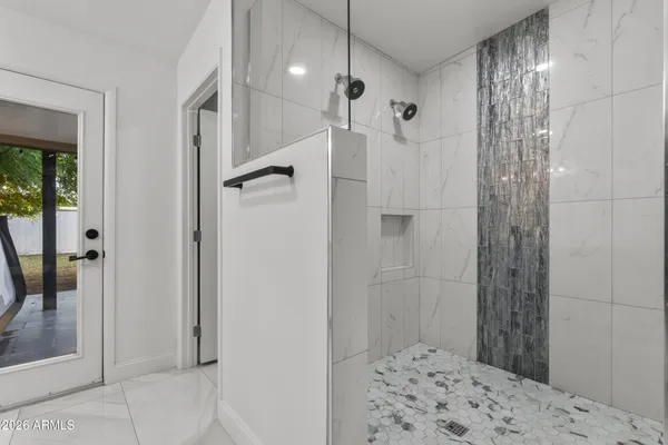 a workspace with a couch and a window