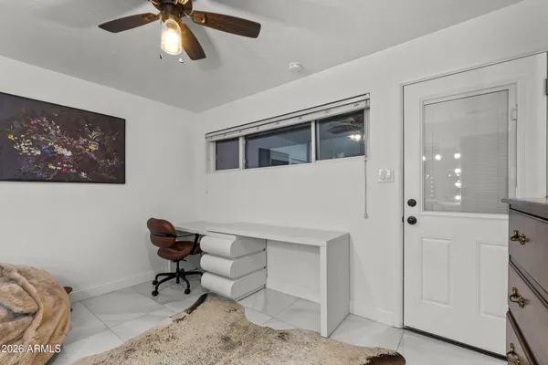 a view of a livingroom with space and furniture