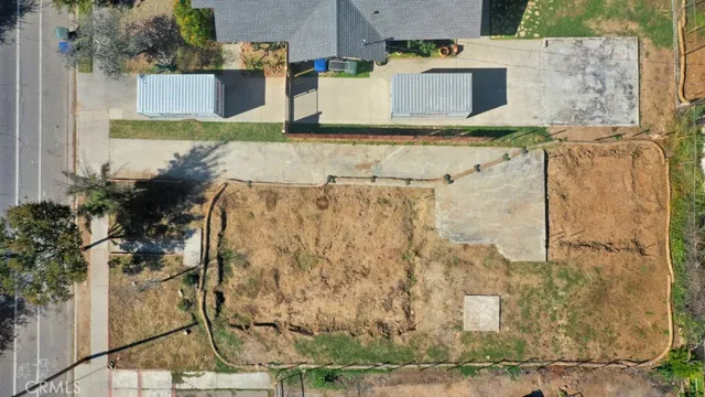 an aerial view of residential houses and outdoor space