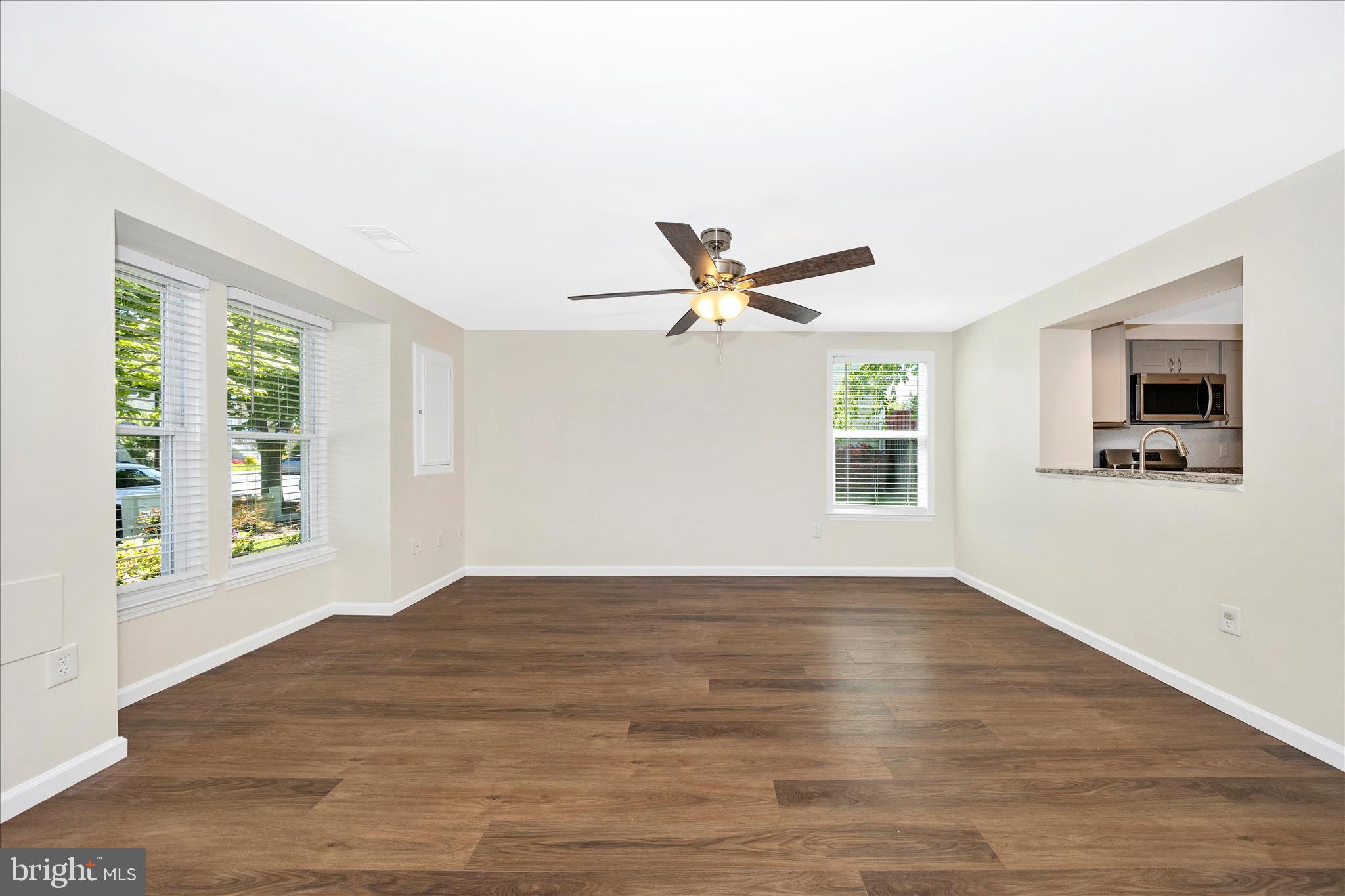 1369 David Lane Frederick, MD 21703 - Photo 12 of 53 a view of empty room with wooden floor and fan