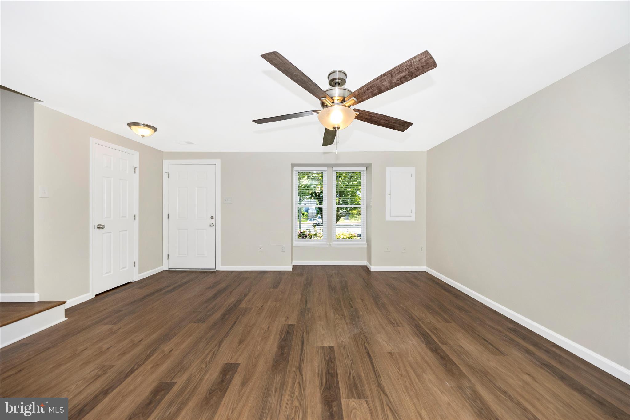 1369 David Lane Frederick, MD 21703 - Photo 13 of 53 wooden floor in an empty room with a window