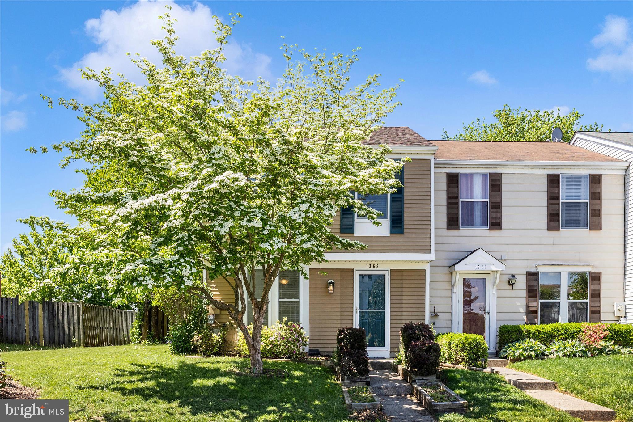 1369 David Lane Frederick, MD 21703 - Photo 2 of 53 front view of a house with a yard