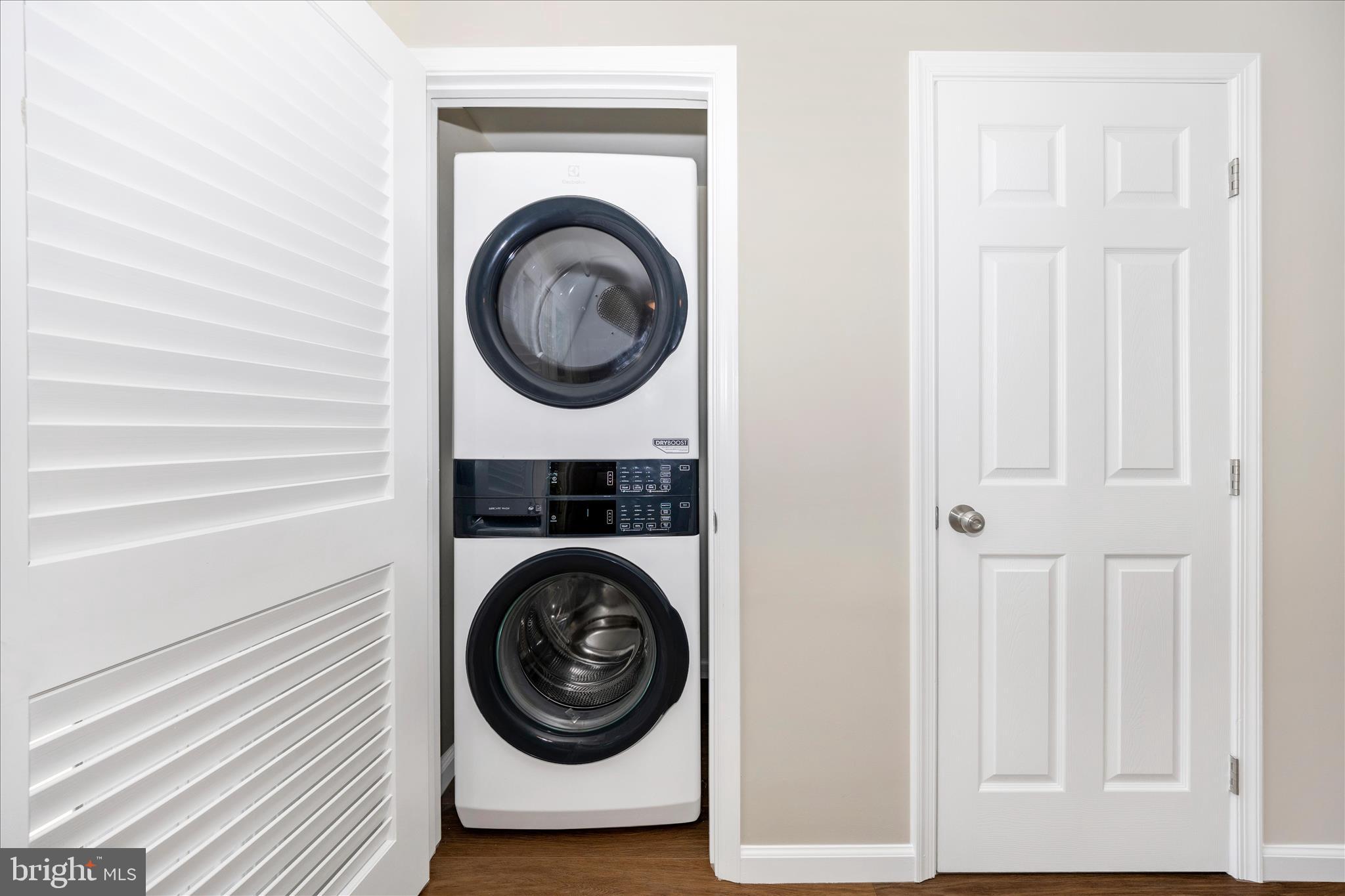1369 David Lane Frederick, MD 21703 - Photo 23 of 53 a close up view of a washer and dryer in a utility room