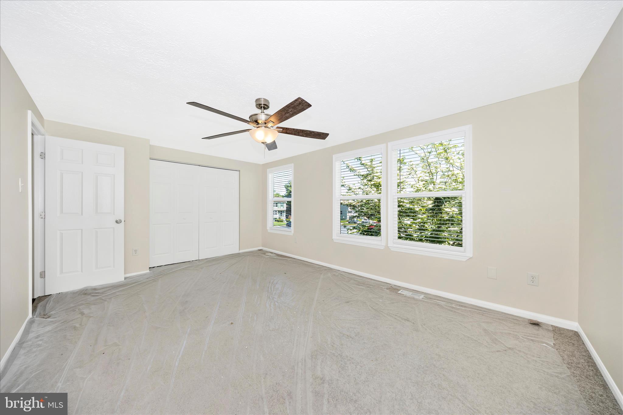1369 David Lane Frederick, MD 21703 - Photo 28 of 53 an empty room with windows and fan