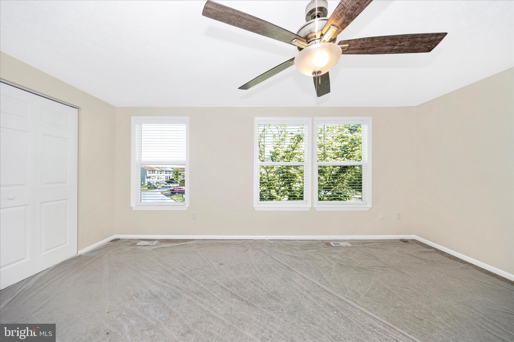 1369 David Lane Frederick, MD 21703 - Photo 29 of 53 an empty room with windows and fan