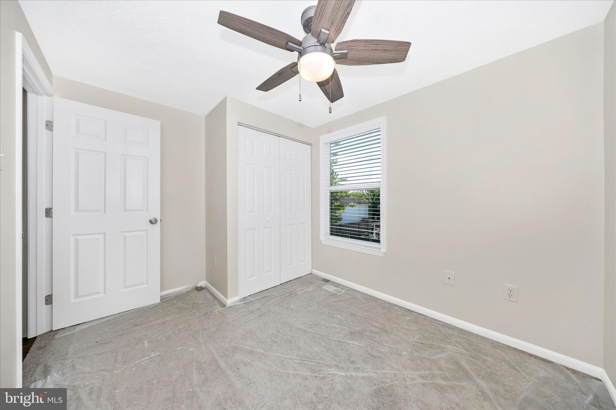 1369 David Lane Frederick, MD 21703 - Photo 32 of 53 an empty room with fan and windows