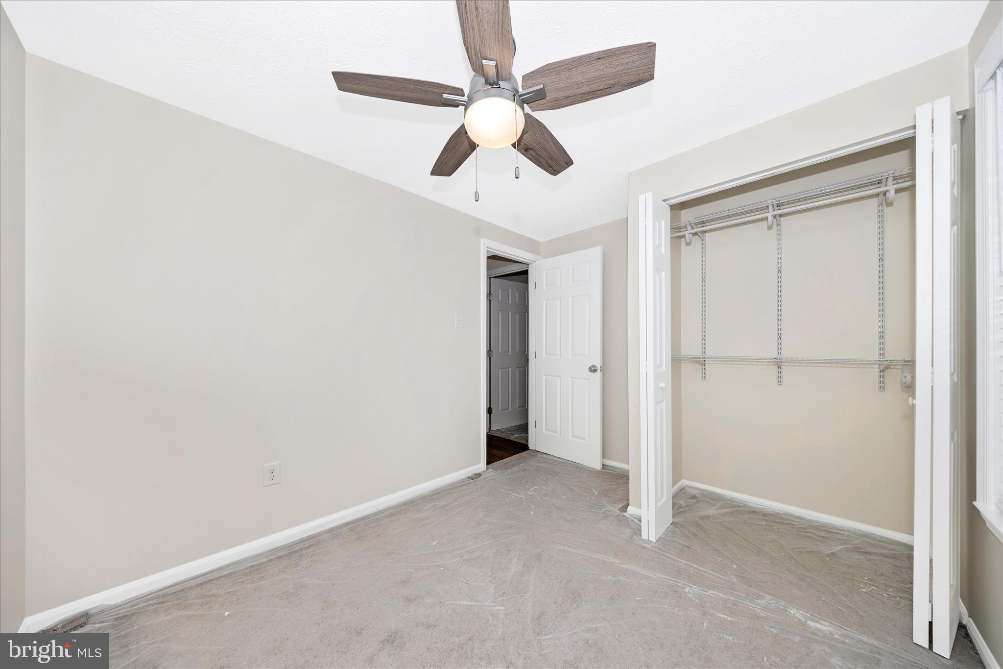 1369 David Lane Frederick, MD 21703 - Photo 33 of 53 an empty room with ceiling fan and window