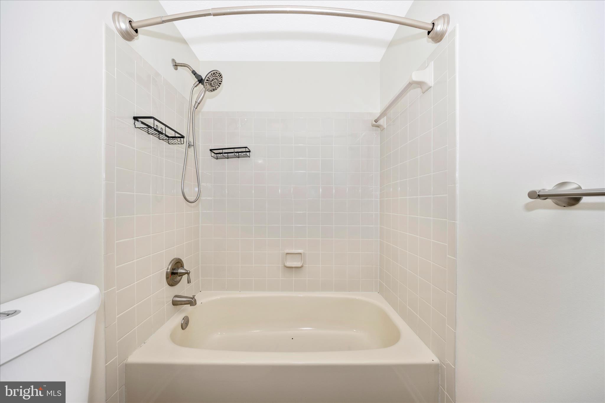 1369 David Lane Frederick, MD 21703 - Photo 40 of 53 a bathroom with a bath tub with a shower