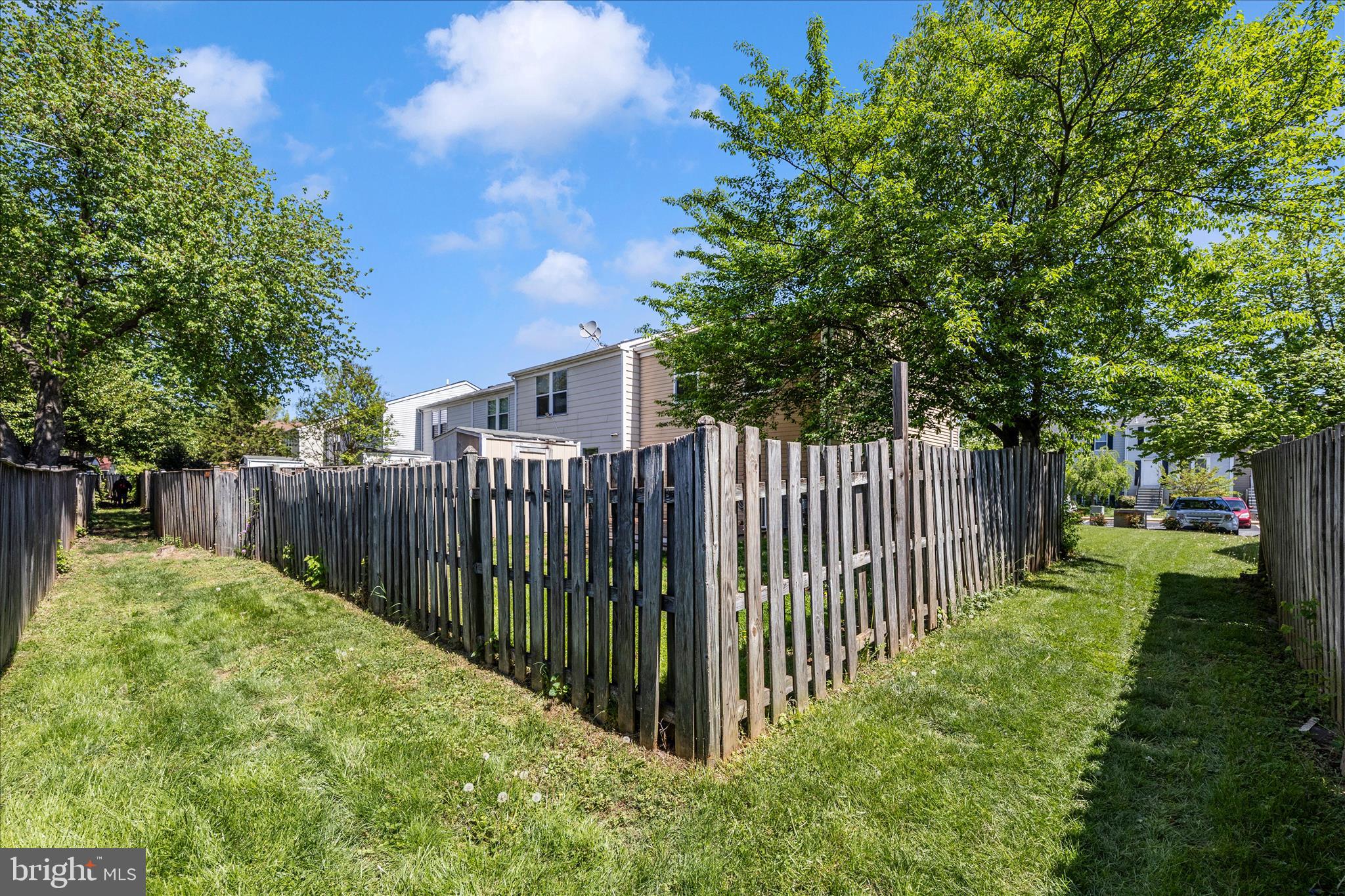 1369 David Lane Frederick, MD 21703 - Photo 53 of 53 a view of a backyard with wooden fence and trees