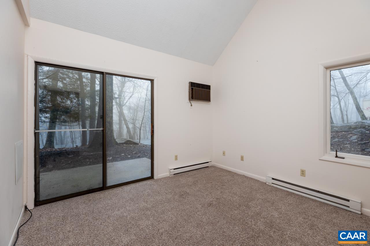 2219 Tanners Ridge Roseland, VA 22967 - Photo 7 of 10 an empty room with sliding door