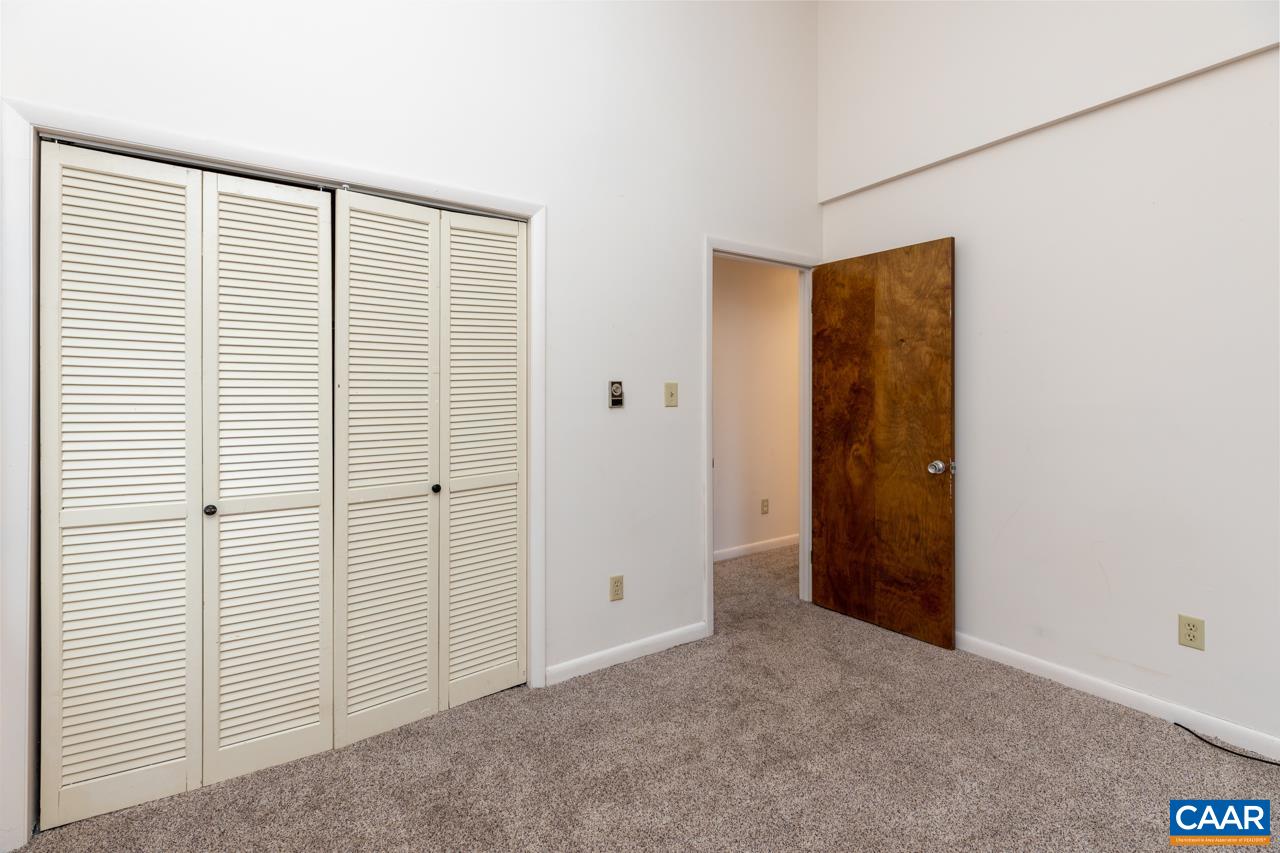 2219 Tanners Ridge Roseland, VA 22967 - Photo 9 of 10 an empty room with windows and closet