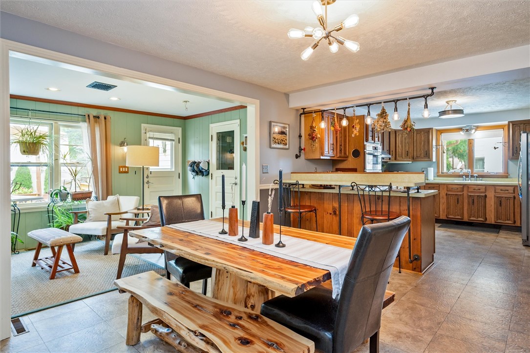 30 Lanark Crescent Rochester, NY 14609 - Photo 8 of 32 Open concept Kitchen/ Dining with a 4 season room