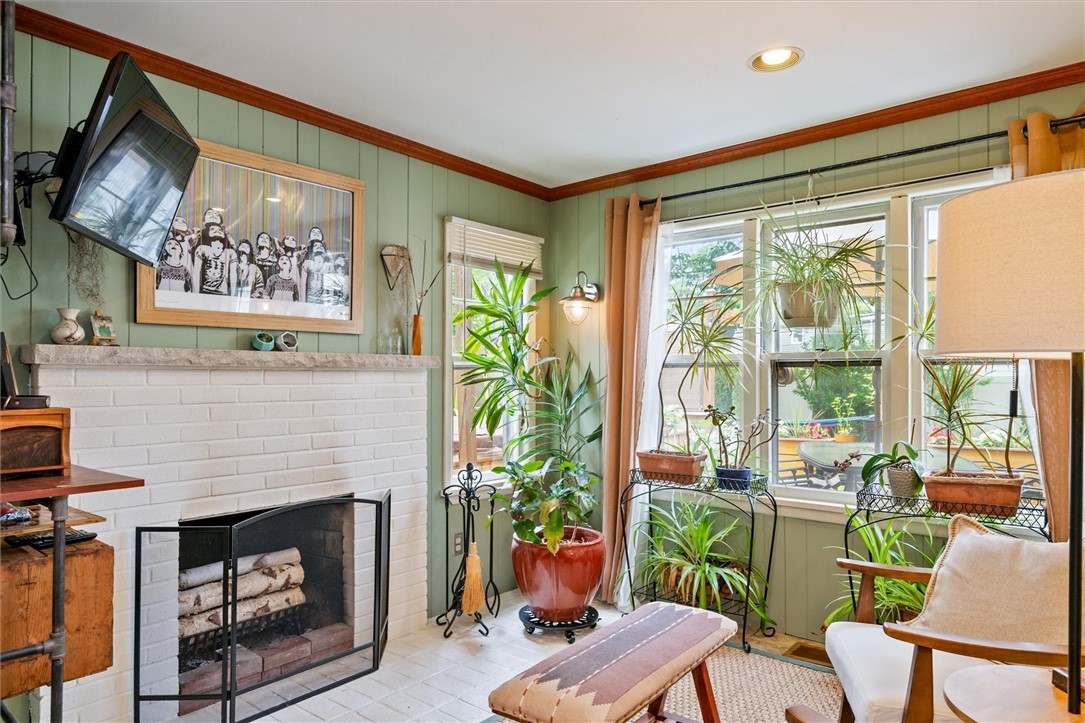 30 Lanark Crescent Rochester, NY 14609 - Photo 9 of 32 4 Season Room with wood burning fireplace