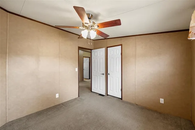 a bathroom with a granite countertop sink a mirror and a