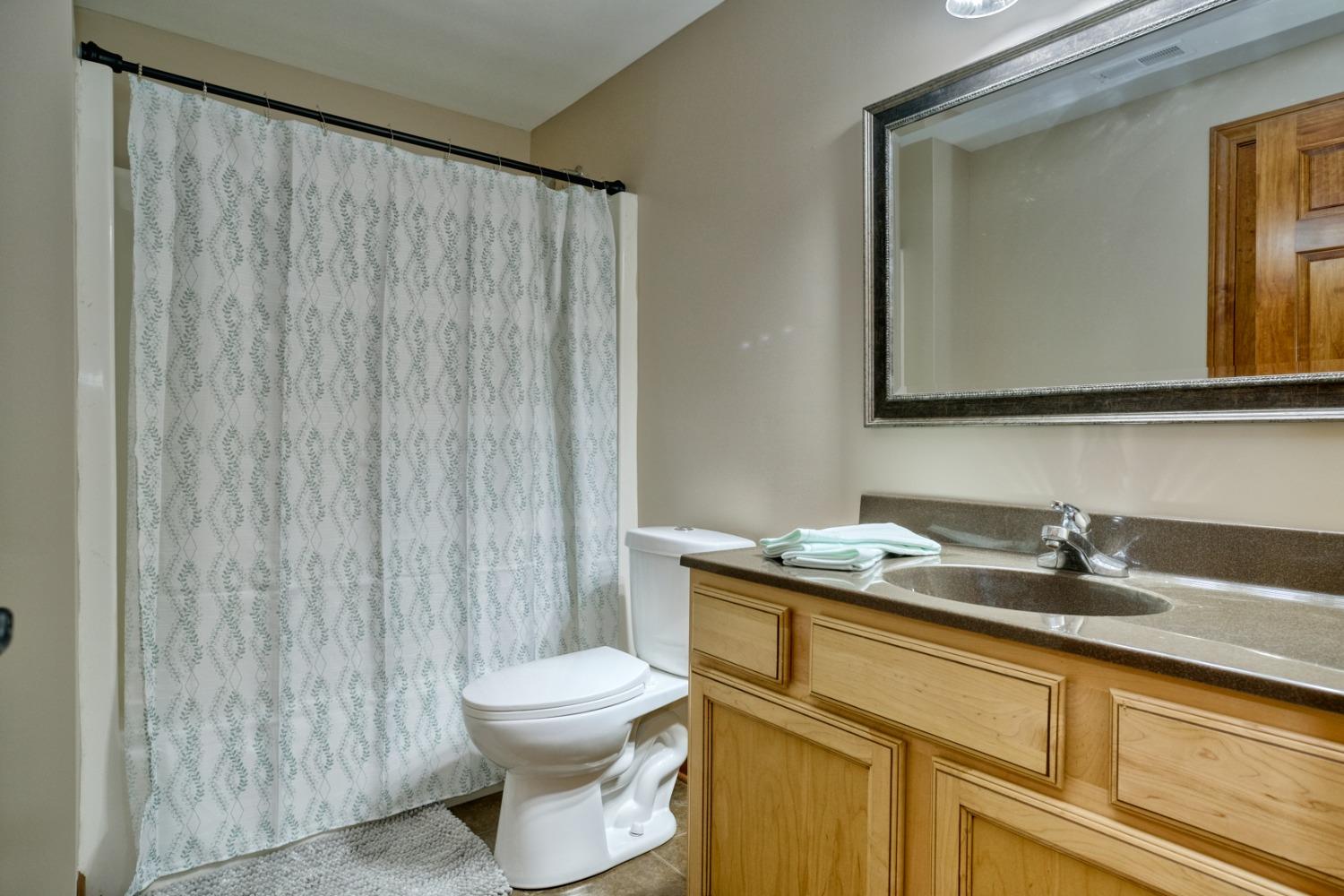 8468 Old Oak Drive Demotte, IN 46310 - Photo 26 of 35 a bathroom with a sink and a toilet