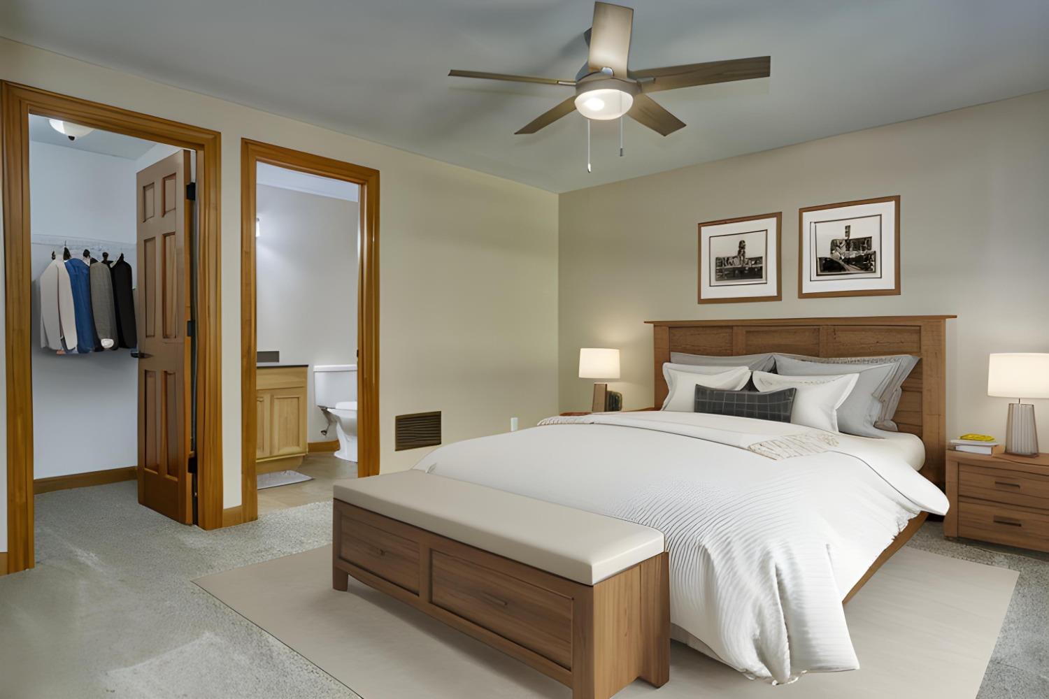 8468 Old Oak Drive Demotte, IN 46310 - Photo 27 of 35 a spacious bedroom with a bed and a chandelier