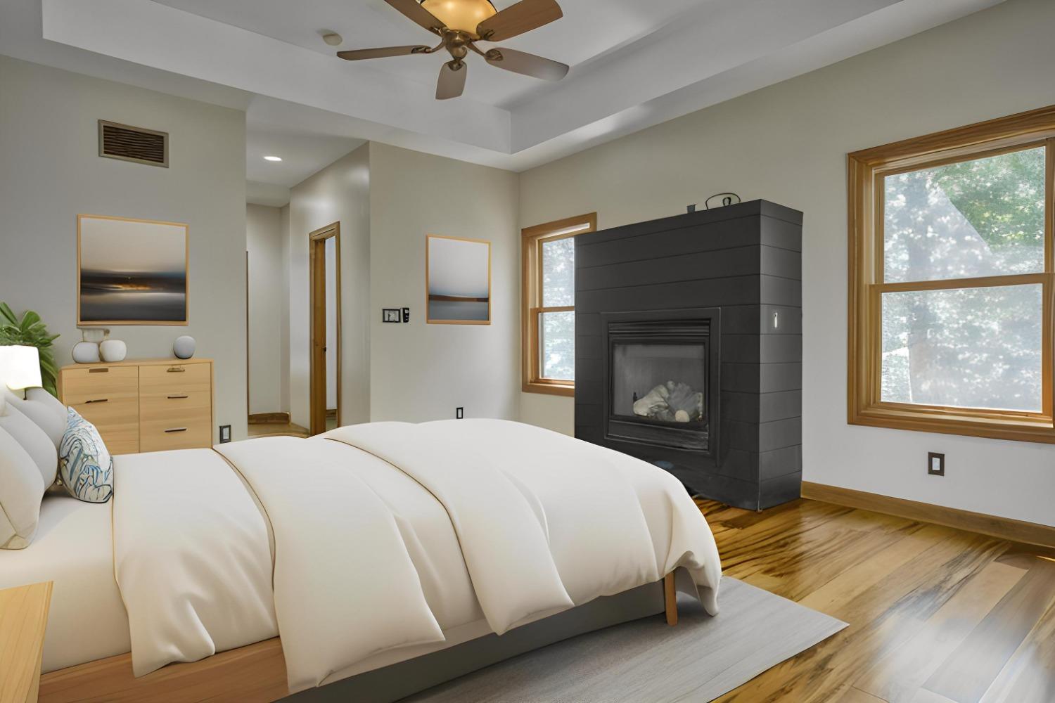 8468 Old Oak Drive Demotte, IN 46310 - Photo 8 of 35 a bedroom with a bed and a fireplace