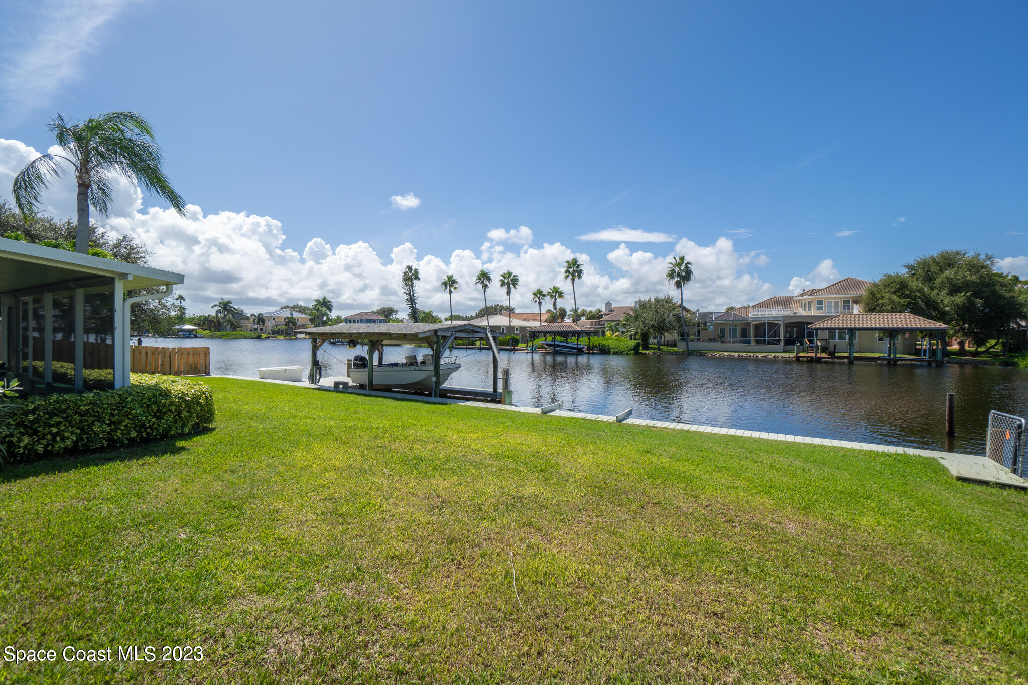 209 River Road Satellite Beach, FL 32937 - Photo 13 of 86 a view of a lake with houses
