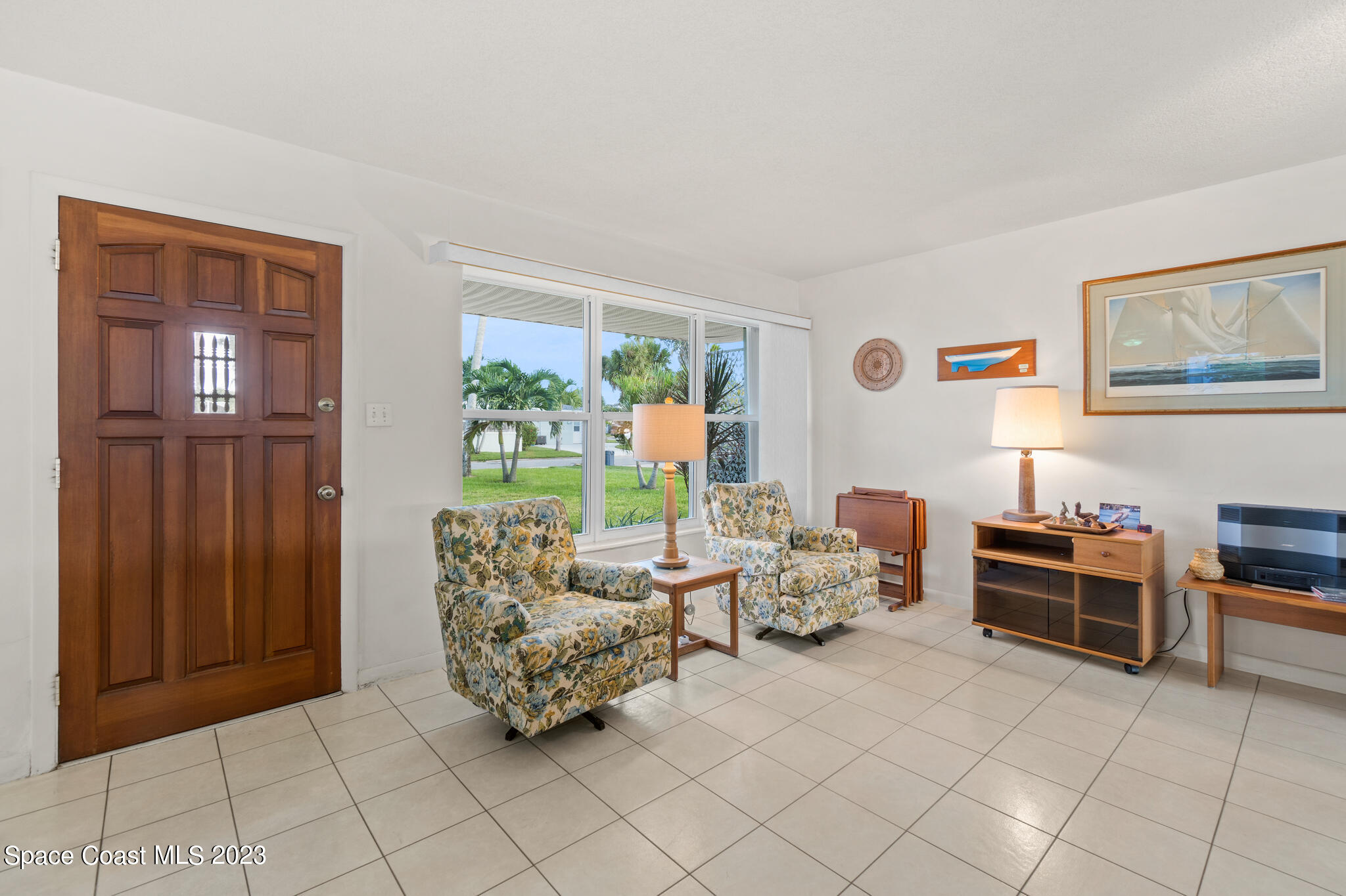 209 River Road Satellite Beach, FL 32937 - Photo 26 of 86 a living room with furniture and a window