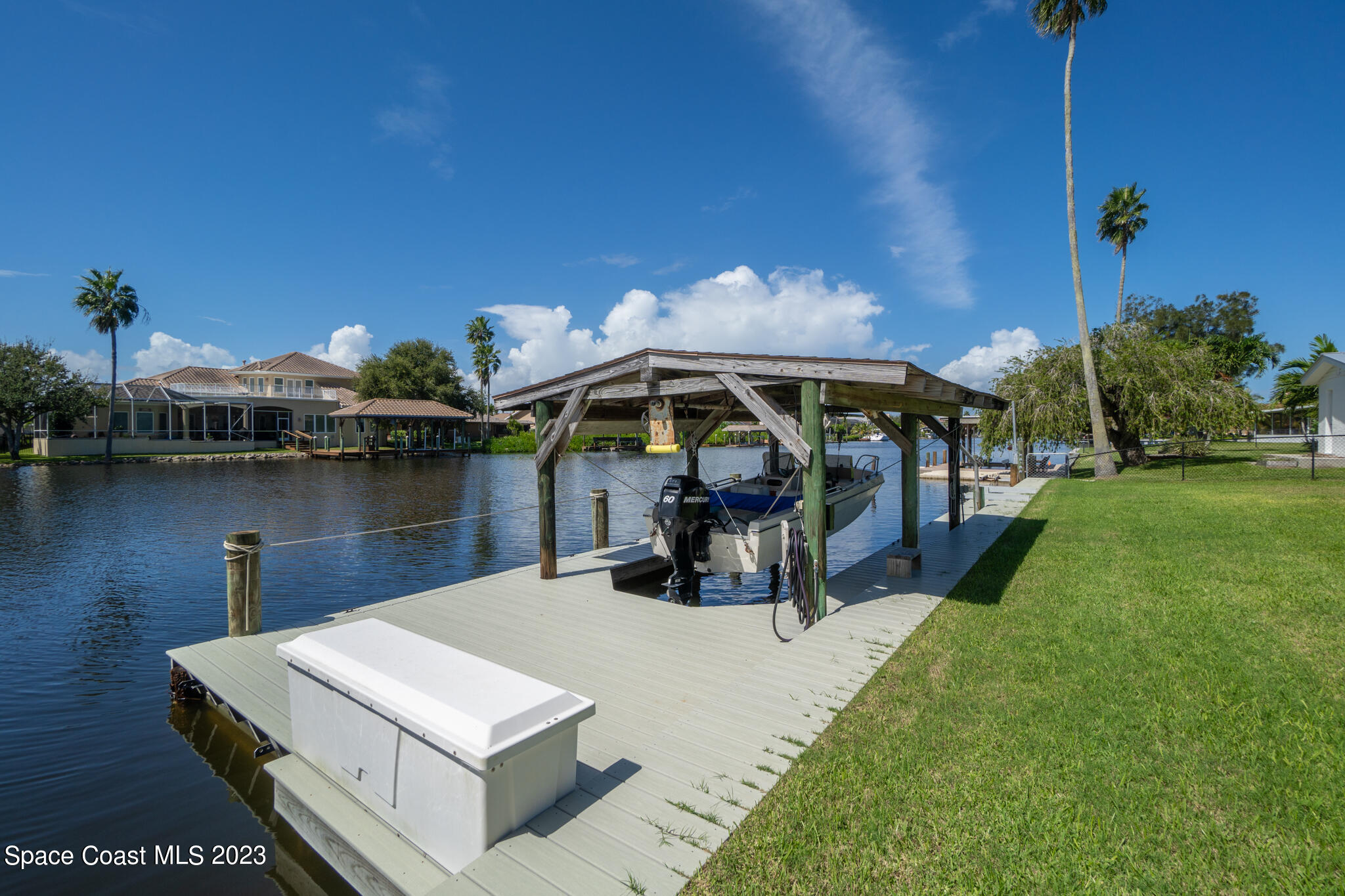 209 River Road Satellite Beach, FL 32937 - Photo 40 of 86 a view of a house with yard and sitting area