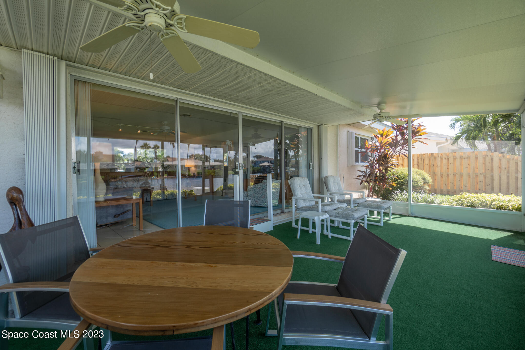 209 River Road Satellite Beach, FL 32937 - Photo 48 of 86 a view of a dining room with furniture window and outside view