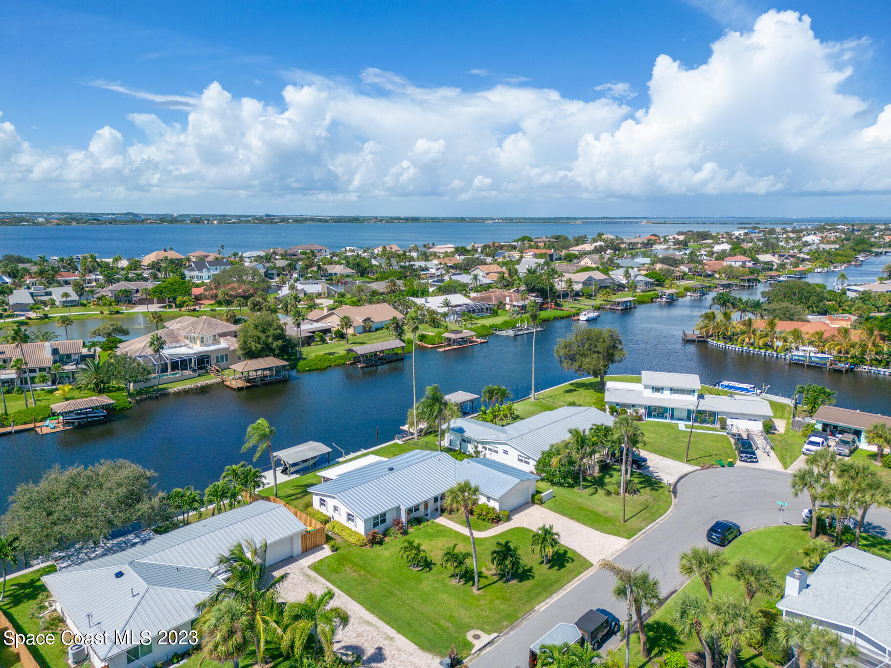 209 River Road Satellite Beach, FL 32937 - Photo 67 of 86 an aerial view of a house with a lake view