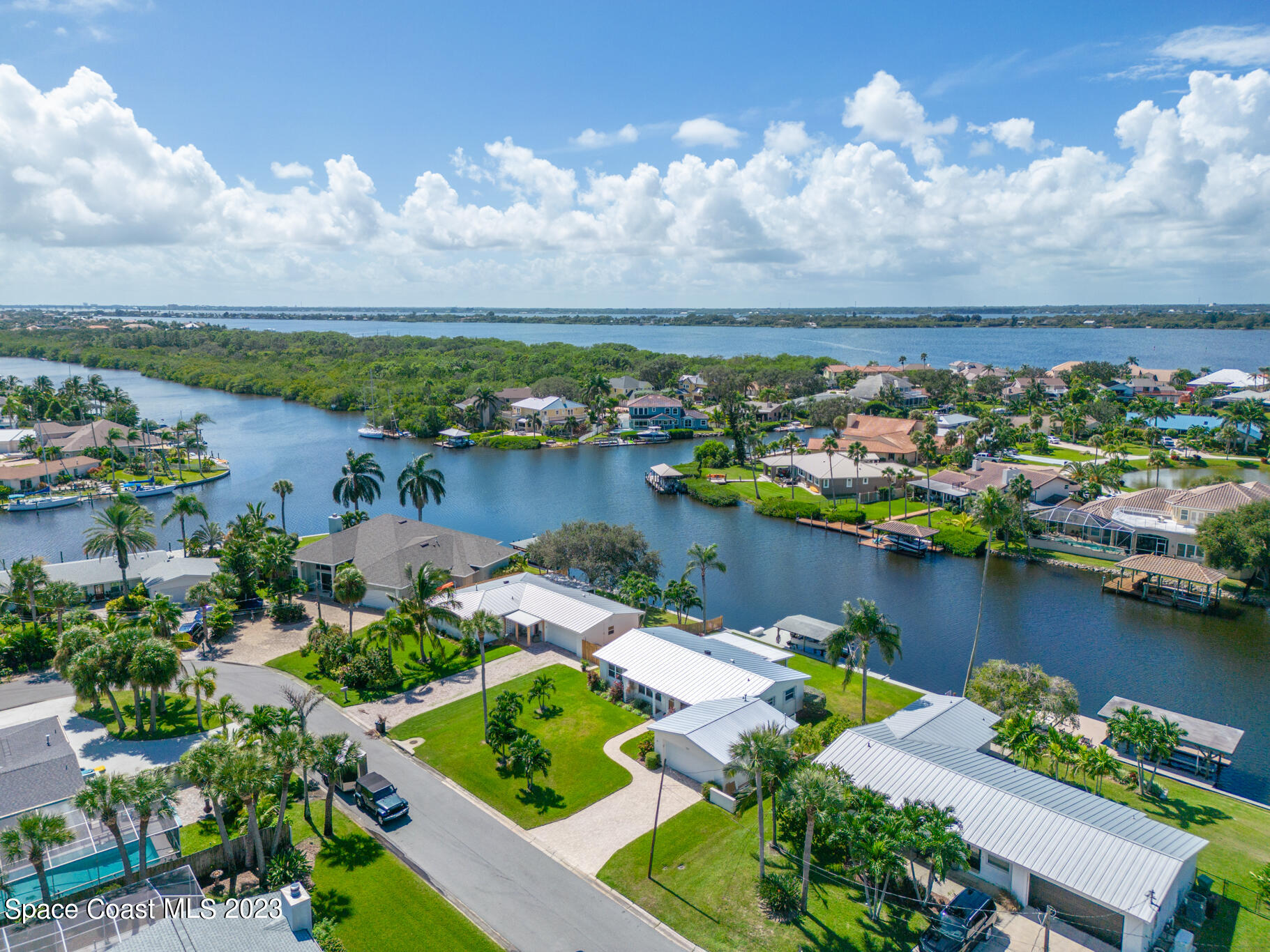 209 River Road Satellite Beach, FL 32937 - Photo 69 of 86 an aerial view of a houses with outdoor space