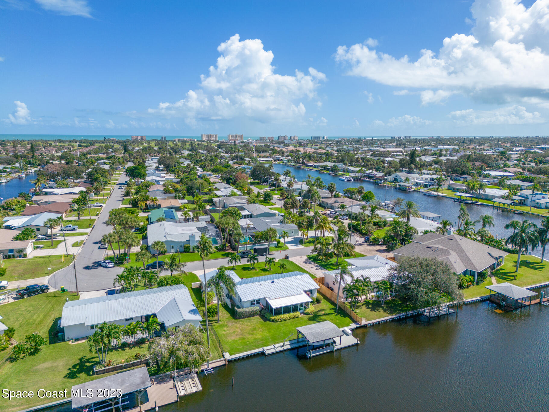 209 River Road Satellite Beach, FL 32937 - Photo 70 of 86 an aerial view of residential houses with outdoor space and lake view