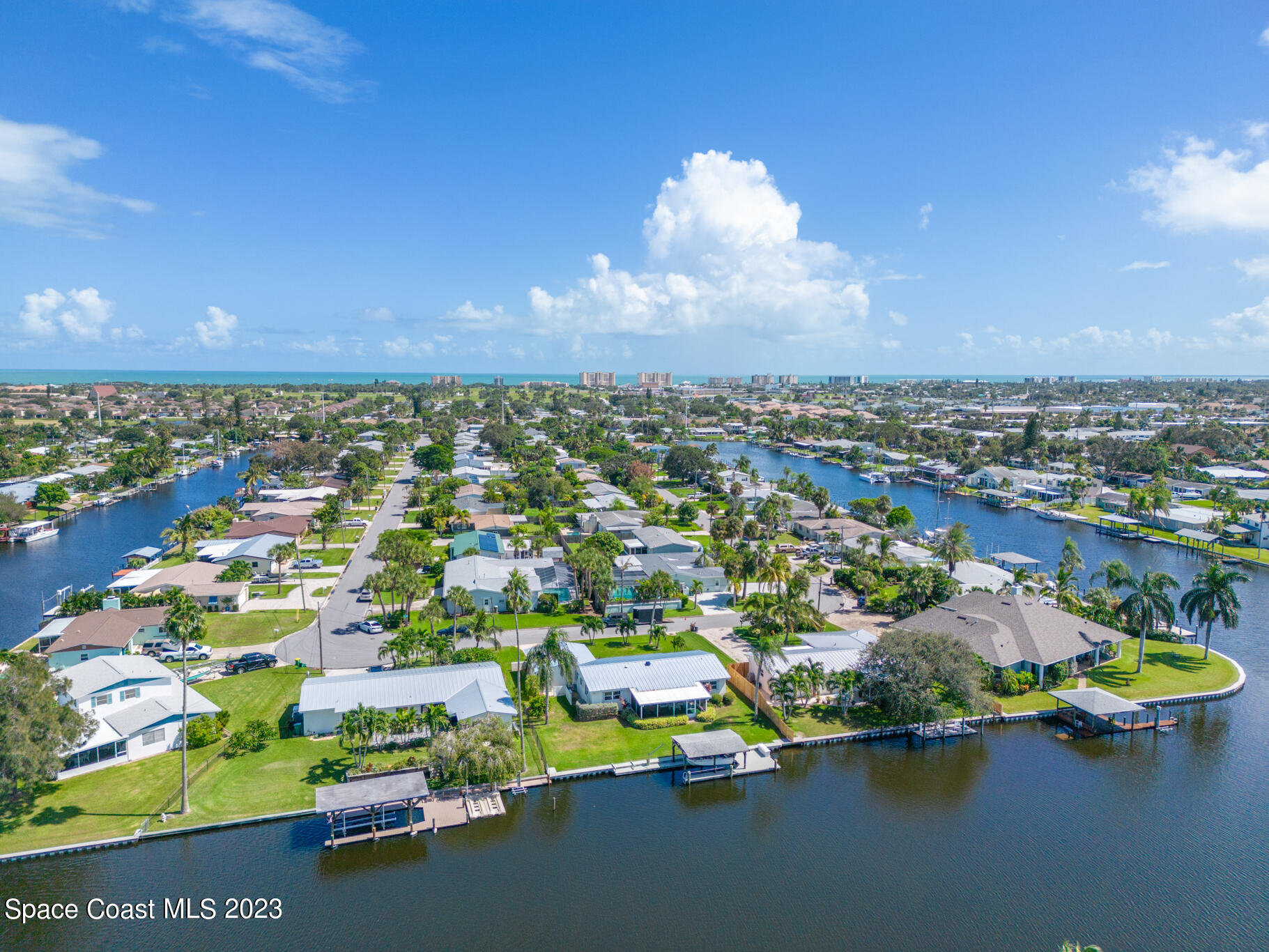 209 River Road Satellite Beach, FL 32937 - Photo 73 of 86 an aerial view of residential houses with outdoor space and swimming pool