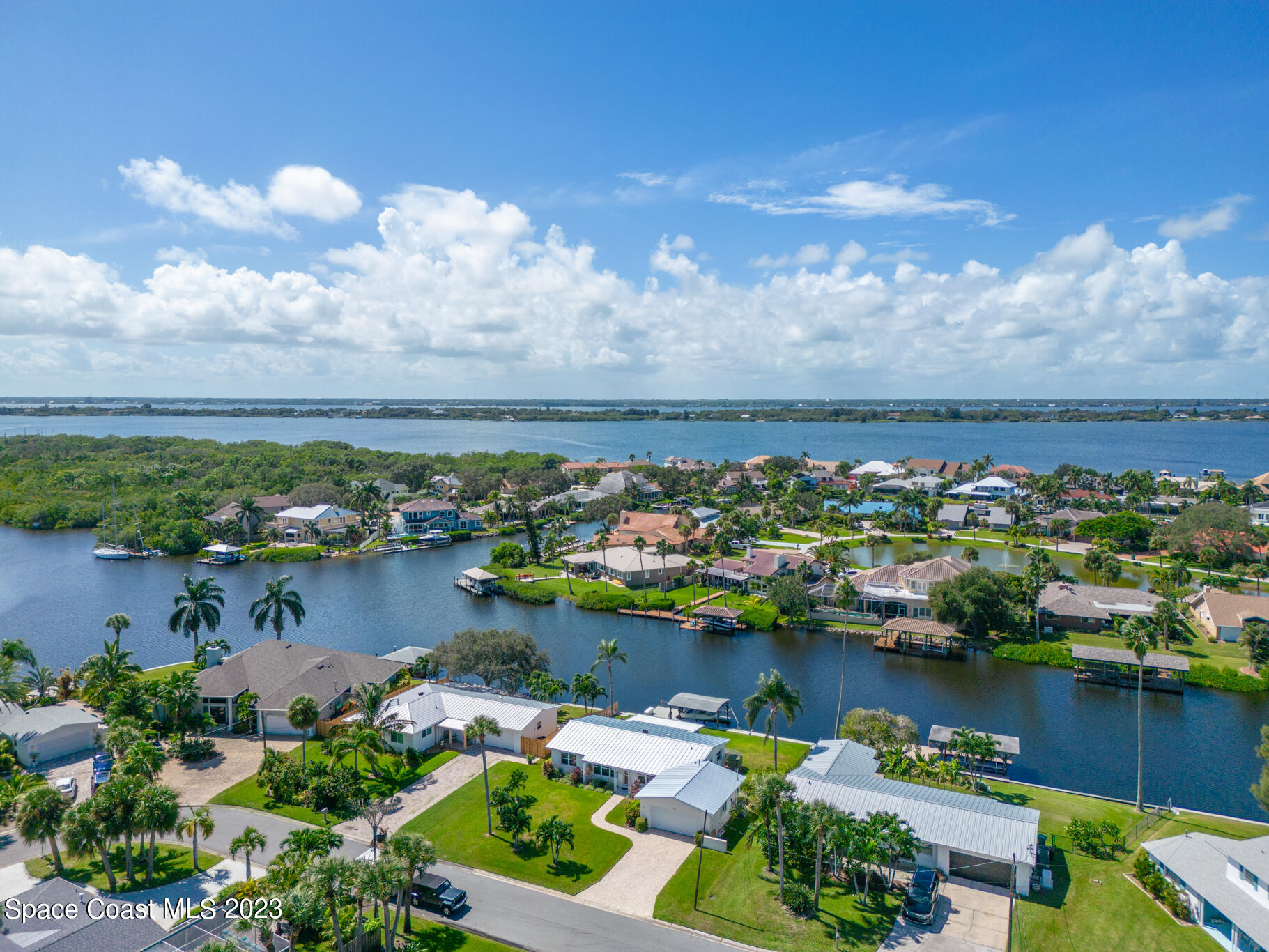 209 River Road Satellite Beach, FL 32937 - Photo 75 of 86 an aerial view of ocean and residential houses with outdoor space