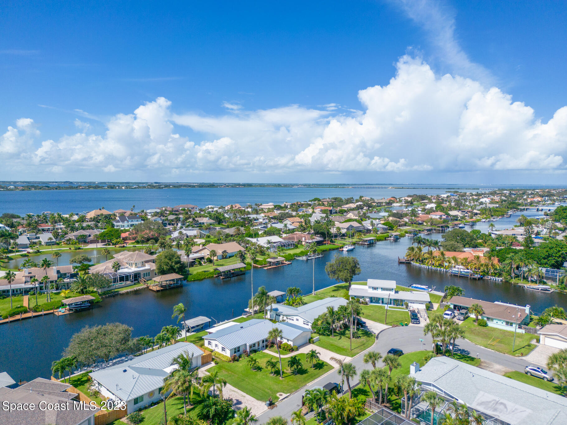 209 River Road Satellite Beach, FL 32937 - Photo 76 of 86 an aerial view of ocean and residential houses with outdoor space