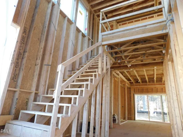a view of a room with large windows
