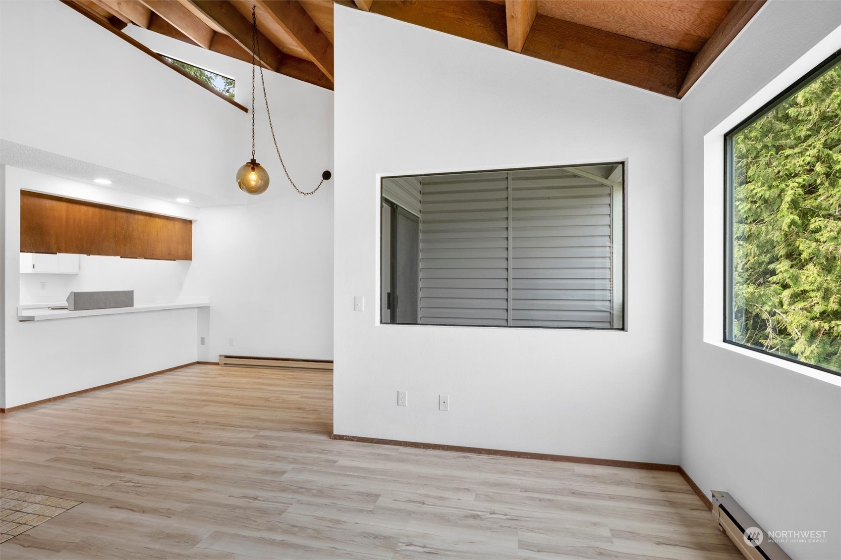 2 Marigold Drive, Unit 26 Bellingham, WA 98229 - Photo 12 of 26 a view of an empty room with wooden floor and a window
