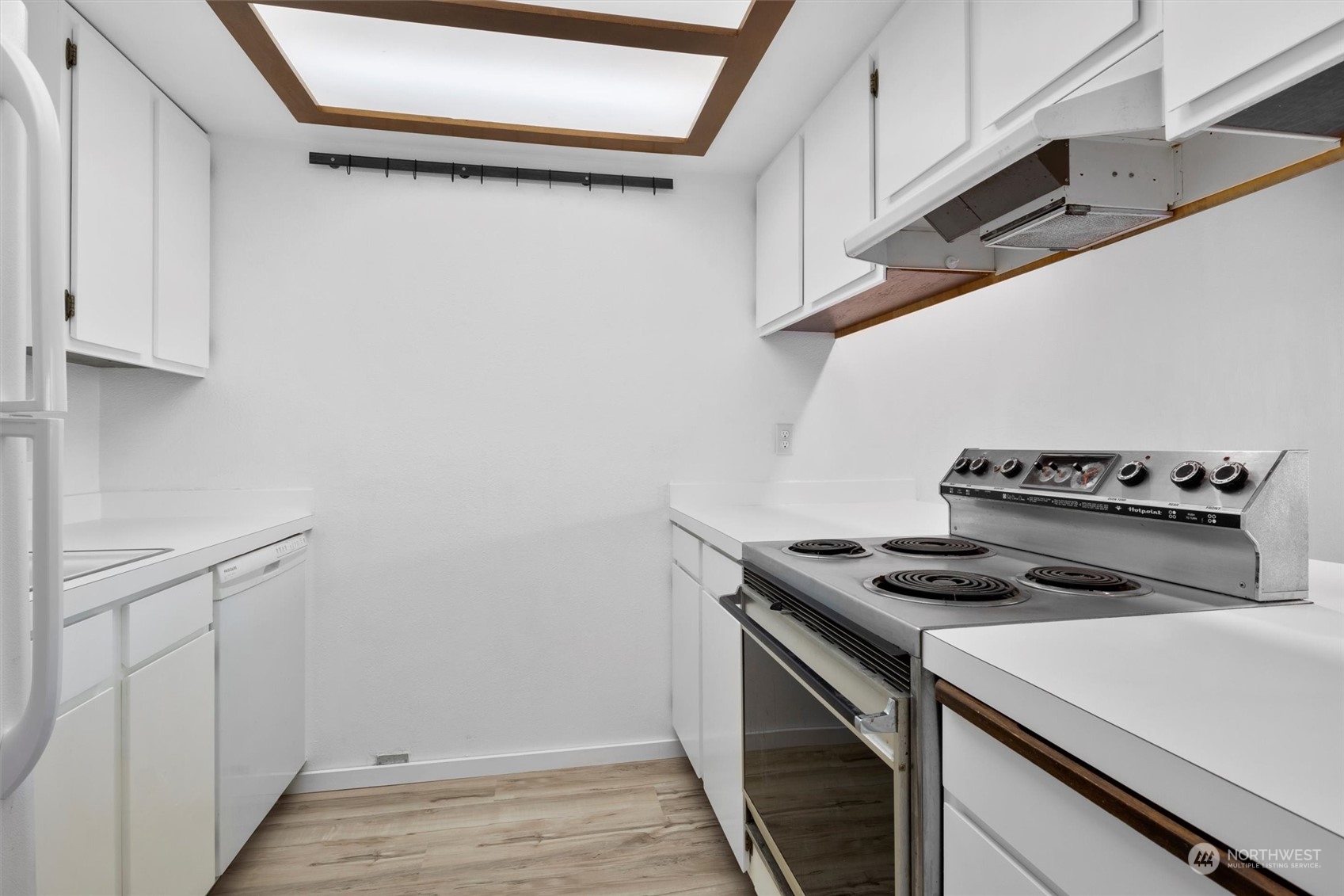2 Marigold Drive, Unit 26 Bellingham, WA 98229 - Photo 7 of 26 a kitchen with a stove and a microwave